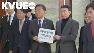 Lawmakers call for South Korean president to resign after declaring martial law [upl. by Drusus109]