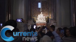 New Addition to the Pietà Vatican Adds Bulletproof Glass to Famous Work of Art [upl. by Ecnarual90]