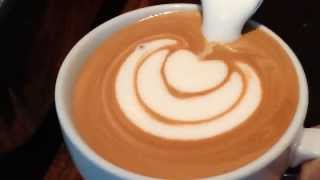 How to make Latte Art The Basics in Slow Motion by Barista Dritan Alsela [upl. by Enogitna819]