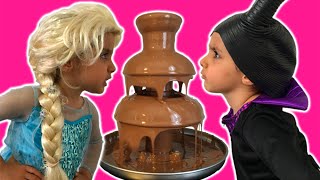 Elsa Vs Maleficent Real Life Disney Princess Movie  CHOCOLATE FOUNTAIN  Candy  10 Surprise Eggs [upl. by Phail788]