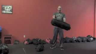 How to Perform Ultimate Sandbag Training Cyclone Exercise [upl. by Gershon367]