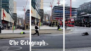 Pedestrians blown over by strong winds as Storm Eunice batters Britain [upl. by Jamel799]