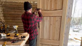 Putting my first door on my Off Grid Log CabinSurvivalwoodwork wilderness exploration [upl. by Irual]