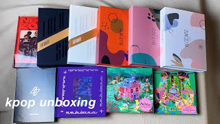 unboxing a bunch of kpop albums just for you [upl. by Shoshanna117]