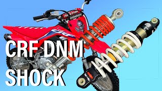 CRF110 SUSPENSION UPGRADE HOW TO INSTALL DNM SHOCK [upl. by Lemieux865]