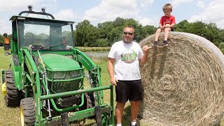 Can a Compact Tractor Move Large Round Bales [upl. by Lilias]