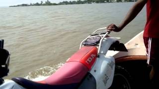 Crossing Kokkilai Lagoon Sri Lanka on Boat with Honda XR 250R20160107 [upl. by Itoyj]