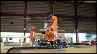 KUKA robot KR 1000 titan stacks wood overseas [upl. by Sari918]