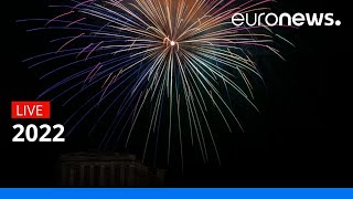 Happy New Year Greece The Acropolis in Athens forms the backdrop for fireworks in the Greek capital [upl. by Oretos]