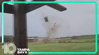 Landspout sends sheets of metal flying in Polk County yard [upl. by Adnil]