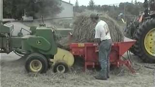 The St George Company  Altec Hay Unwinder on a John Deere 336 [upl. by Ellenij]