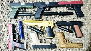 Pistol mainan desert eaglehk usp glock 19 colt 1911 shell ejection water gelltoy guns [upl. by Ahsilaf]