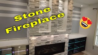 Stacked stone Fireplace setting the stone [upl. by Ennoira]