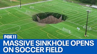 Video captures moment sinkhole opens on soccer field [upl. by Adnalor994]