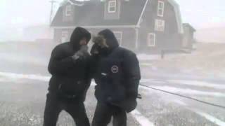 Reporters fall lose microphone during live blizzard update [upl. by Assenab]