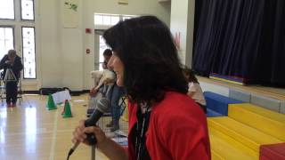 Longmeadow Center School principal Donna Hutton puckers up to kiss lizard in honor of kids reading [upl. by Neelehtak]