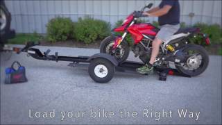 Stinger Single Folding Bike Trailer easy loading and storage Live and in CGI [upl. by Atilrahc]