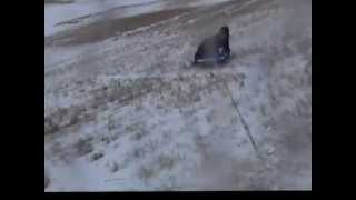 pulling a sled behind a quad [upl. by Berey244]