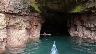 Sea kayak paddle through the tunnels of Lyra Skerry and Holga Skerry Papa Stour Shetland Isles [upl. by Tonina]