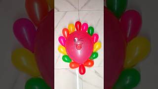 Winking eye balloon with 14 mini balloons popping reverse asmr [upl. by Corette]