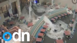 Shocking CCTV Flash flood smashes through hospital doors [upl. by Charita561]