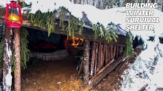 Winter BUSHCRAFT Building of a warm underground shelter for survival in winter forest [upl. by Ahsiak861]