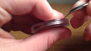 How to open air tight seals on coin cases [upl. by Brenza]