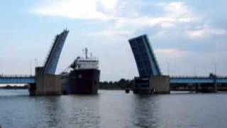 Algoway freighter traversing Saginaw River in Bay City drawbridge raising [upl. by Farrison917]