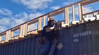 Cutting and framing the 12 inch eave on our shipping container barn [upl. by Eninej]