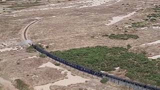 Romney Hythe amp Dymchurch Railway train leaving Dungeness seen from top of Dungeness Lighthouse [upl. by Nyliahs]