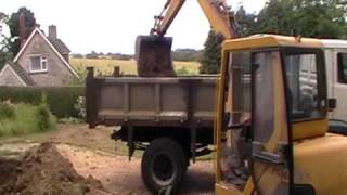 Komatsu PC45 Dig out amp Muck away [upl. by Wehtta]