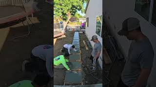 Concrete slab action going in on the front yard from the garage to the front door [upl. by Brandtr748]