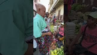 Zorange sour nan mache Okap la frerejoel haitiancreole streetfood food manjehaitian [upl. by Hanahs]