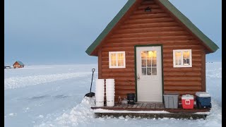 Ice fishing in a log cabin Glamping on Lake of the Woods day 3 at Bostic Bay Luxury Ice Cabins [upl. by Amled]