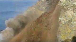 Video shows cliff fall into sea [upl. by Enillebyam]