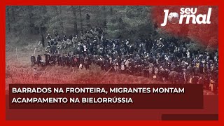 Barrados na fronteira migrantes montam acampamento na Bielorrússia [upl. by Ellenhoj]