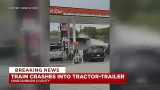 Caught on cam Train hits tractortrailer in Spartanburg County [upl. by Aitret]