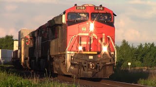 Track Inspection Car on Stack Train CN 120 Rolling thru Moncton NB during Golden Hour [upl. by Ahsikym]