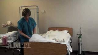 CNA Skills Making an Occupied Bed Making Part 1 [upl. by Yendic]