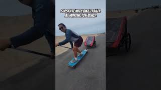 Skateboard with a bike trailer attachment dadlife supskate biketrailer longboard hamboards [upl. by Yevi749]