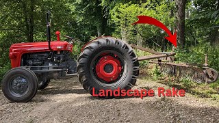 Landscape rake on MF 35 to refresh old stone driveway [upl. by Arocahs777]