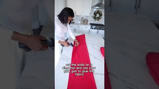 Make a jawdropping Christmas pillow bow using a flat pillow red sheets zip ties a glue gun and [upl. by Nywnorb577]