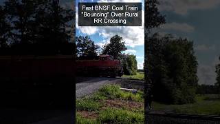 BNSF Coal Train Bouncing Over Rural Railroad Crossing shorts trainvideos railfanning [upl. by Annahsal]