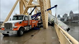 Tow truck crew says years of experience helped them pull dangling semi back onto 2nd Street Bridge [upl. by Dnalra]