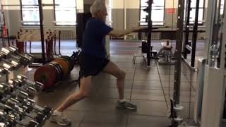 Senior Golfer performs Split Stance Contralateral Cable Row amp Reach [upl. by Calle263]