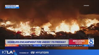 Homeless encampment erupts in flames under 170 Fwy [upl. by Fiedling]