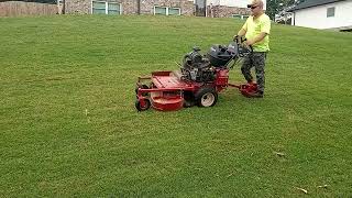 before and afters and mowing steep incline front yard [upl. by Ynatsed]