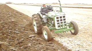 550 Oliver tractor with 2 bottom mounted Oliver plow [upl. by Thetisa]