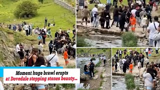 News Moment huge brawl erupts at Dovedale stepping stones beauty spot as people hurl large sticks [upl. by Waldemar]