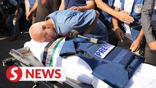 Stop killing journalists Gazans mourn Palestine TV reporter [upl. by Airdnala]